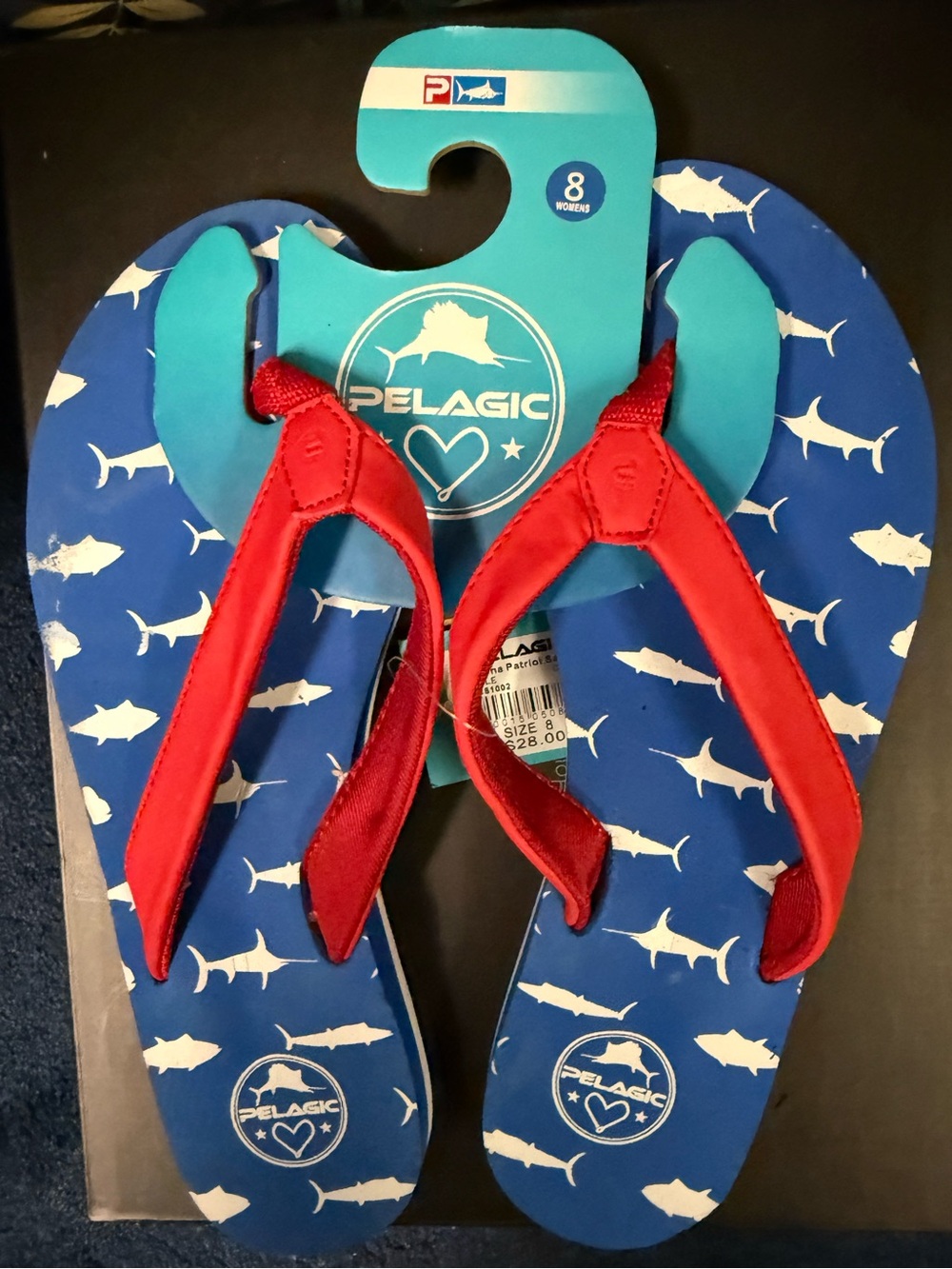 Pelagic Blue Flip Flops with Red Thong Straps and White Fish Print